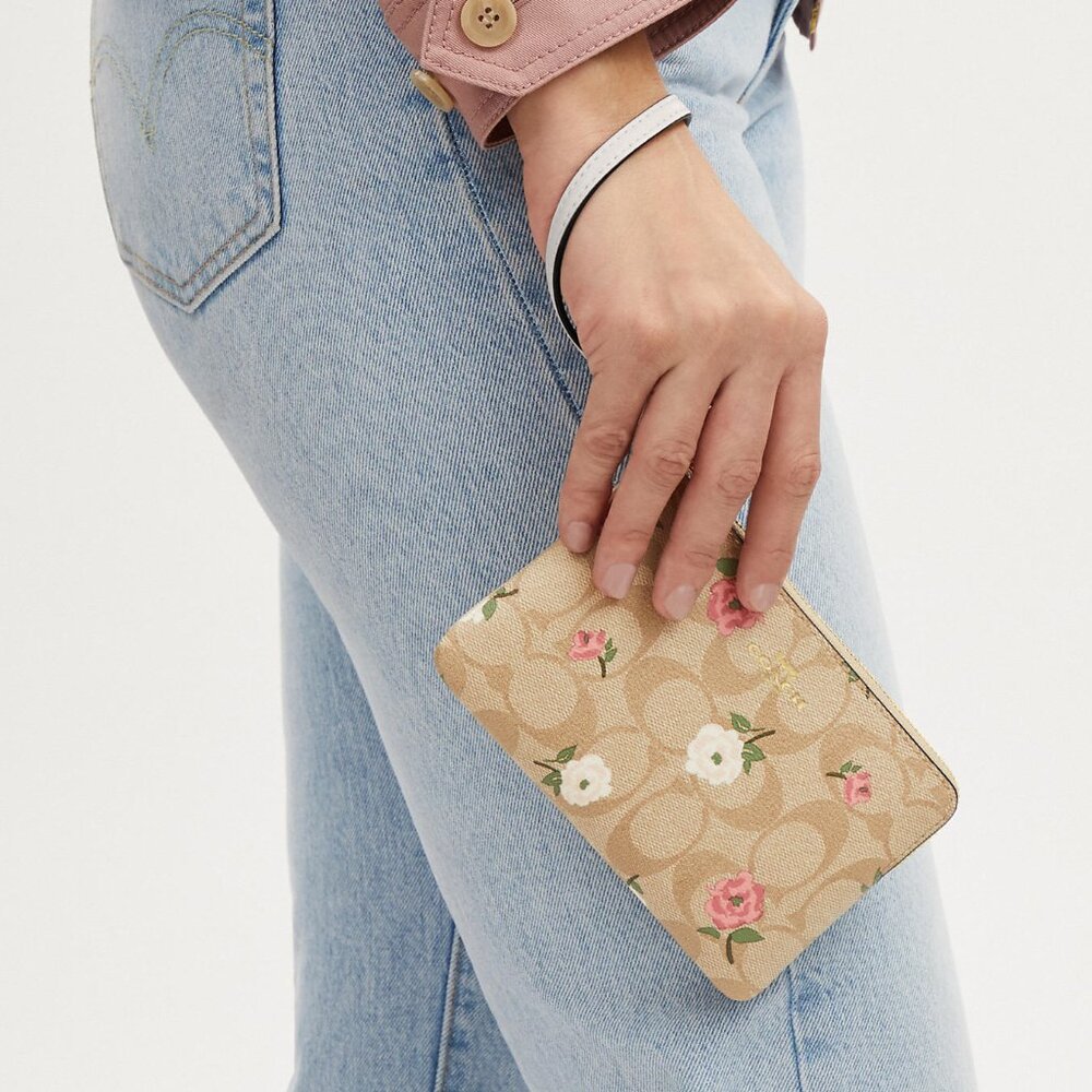 Corner Zip Wristlet In Signature Canvas With Floral Print - Picture 1 of 2